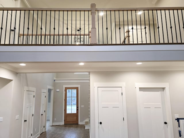 entryway with hardwood / wood-style floors