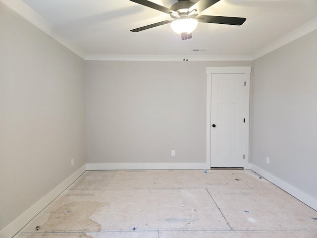 spare room featuring crown molding and ceiling fan