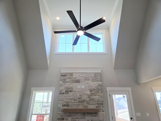 unfurnished living room featuring ceiling fan