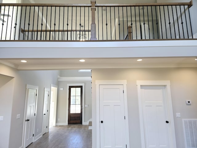 foyer entrance with wood-type flooring