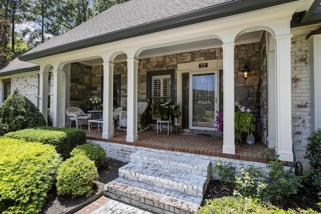 doorway to property with a porch