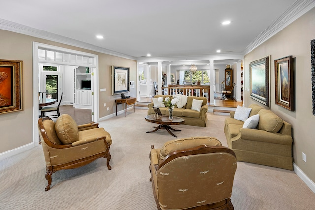 living room featuring ornamental molding, plenty of natural light, and light colored carpet