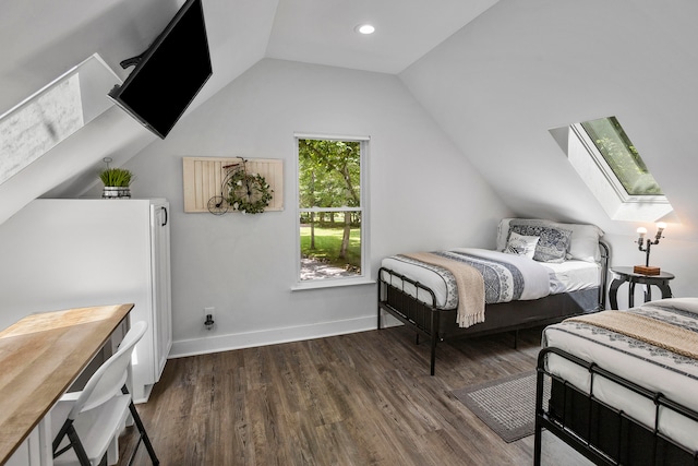 bedroom with dark wood-type flooring and lofted ceiling with skylight