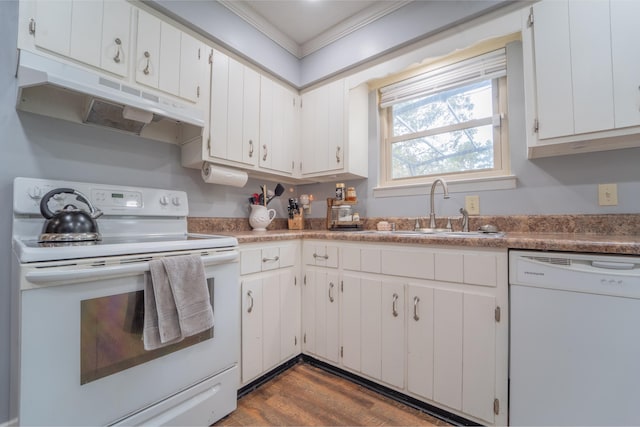 kitchen featuring white appliances, under cabinet range hood, white cabinets, and a sink