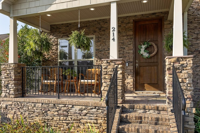 entrance to property with a porch