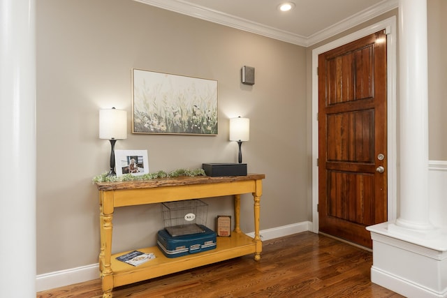 office area with crown molding, dark hardwood / wood-style flooring, and ornate columns