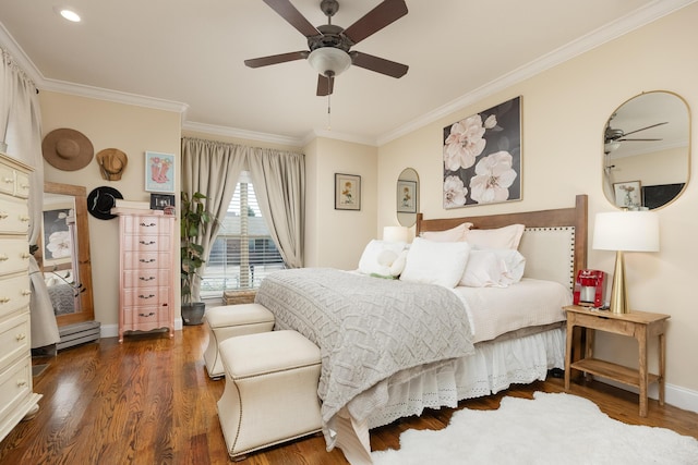 bedroom with baseboard heating, ceiling fan, ornamental molding, and dark hardwood / wood-style flooring