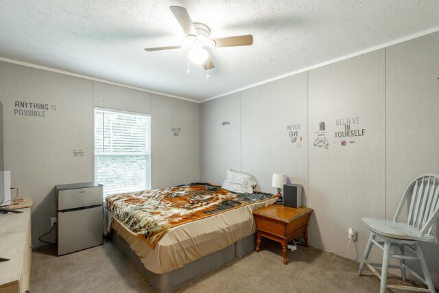 bedroom with light carpet, stainless steel refrigerator, crown molding, a textured ceiling, and ceiling fan