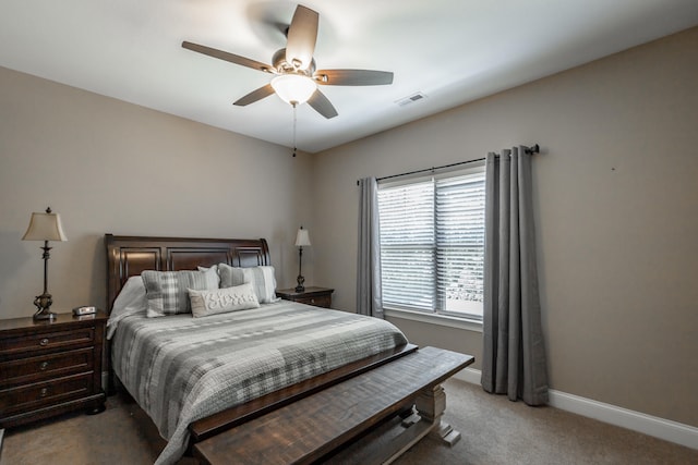 bedroom with ceiling fan and carpet