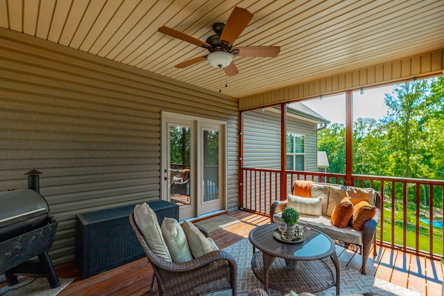 sunroom / solarium with ceiling fan