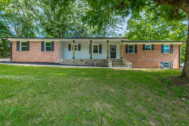 ranch-style home with a front yard