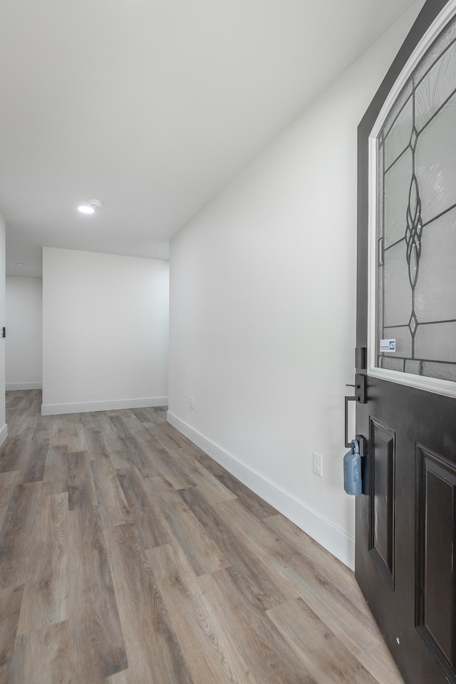 spare room featuring light hardwood / wood-style flooring