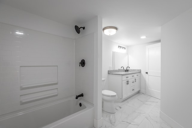 full bathroom featuring tiled shower / bath, toilet, and vanity