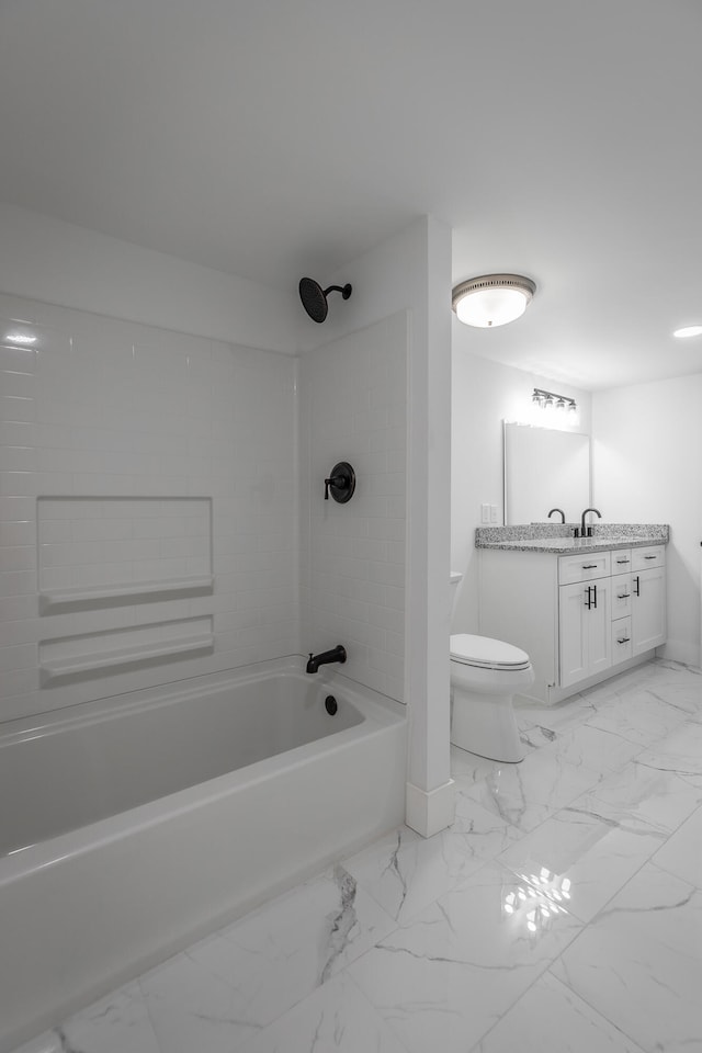 full bathroom featuring vanity, toilet, and tiled shower / bath combo