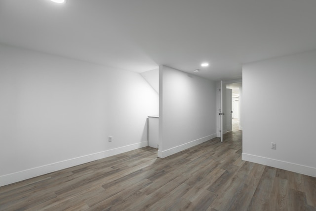 unfurnished room featuring hardwood / wood-style flooring