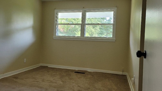 view of carpeted spare room