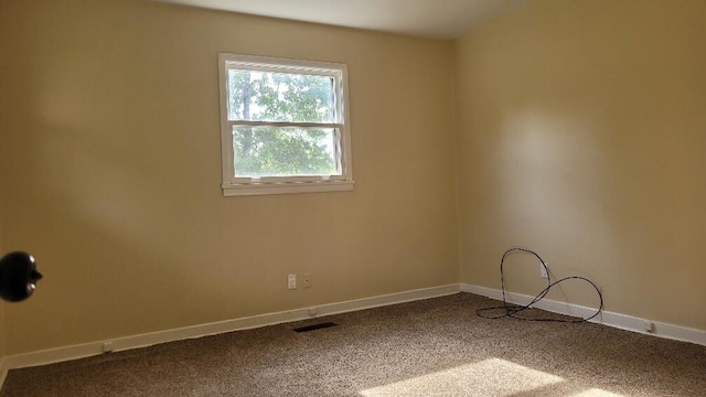 view of carpeted spare room