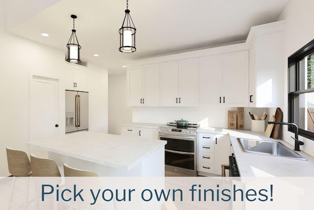 kitchen with a center island, sink, pendant lighting, white cabinets, and appliances with stainless steel finishes