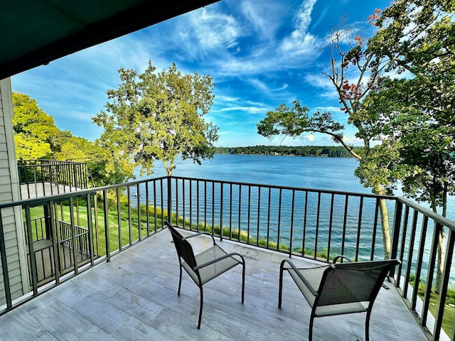 balcony featuring a water view