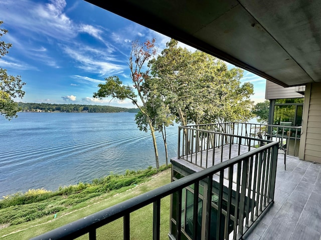 balcony featuring a water view