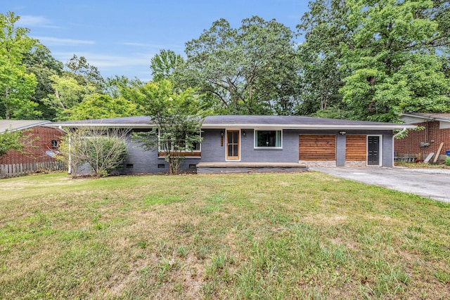 ranch-style home with a front lawn