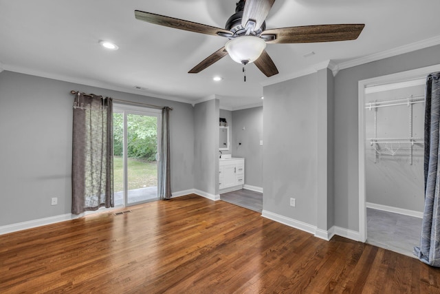 interior space featuring hardwood / wood-style floors and ornamental molding