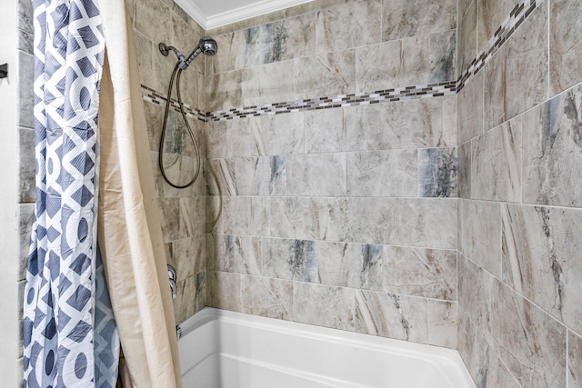 bathroom featuring shower / bath combination with curtain and crown molding