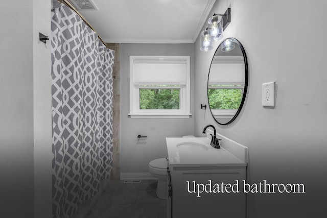 bathroom featuring vanity, toilet, ornamental molding, and walk in shower