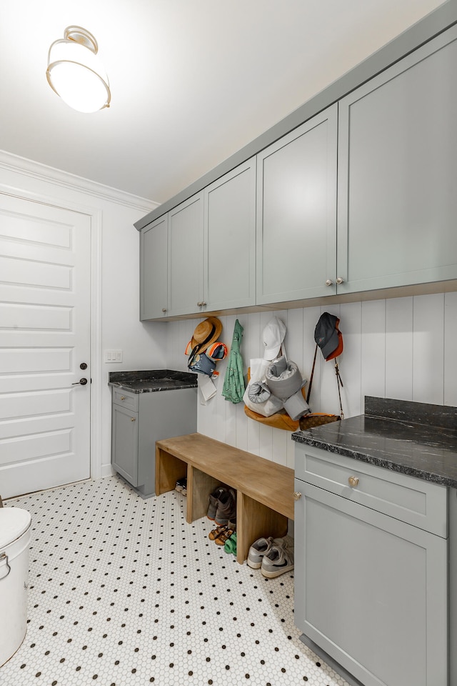 washroom featuring crown molding