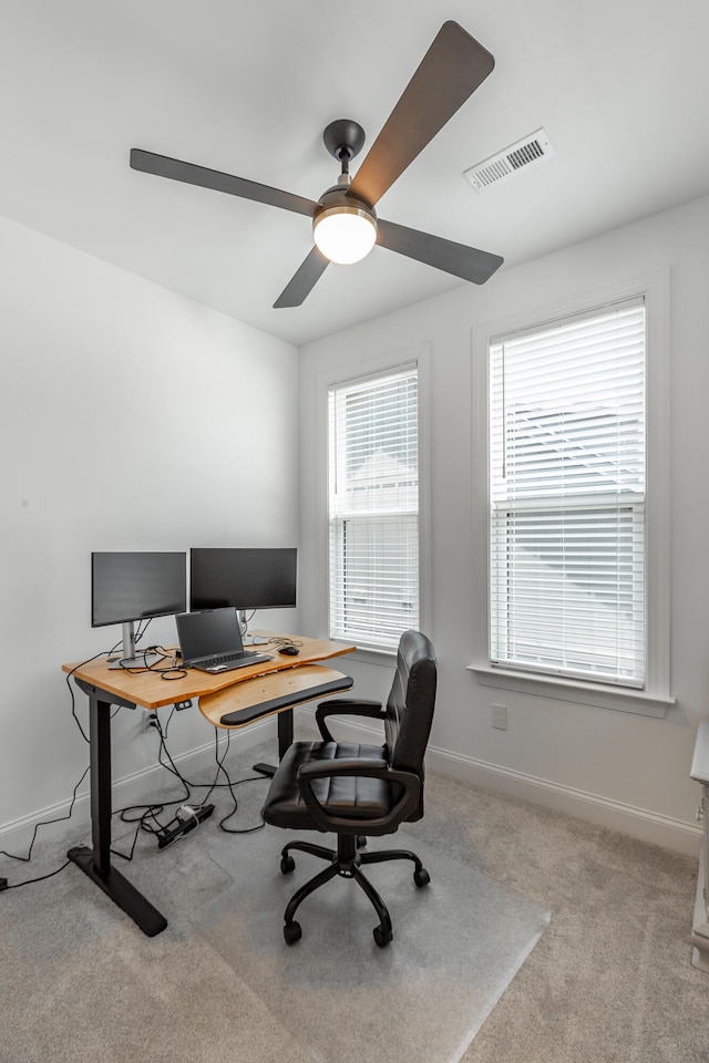 office with ceiling fan and carpet flooring