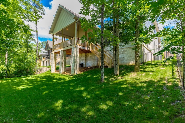 view of yard featuring a wooden deck