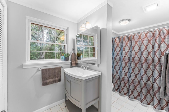 bathroom featuring a shower with shower curtain, tile patterned flooring, crown molding, and vanity