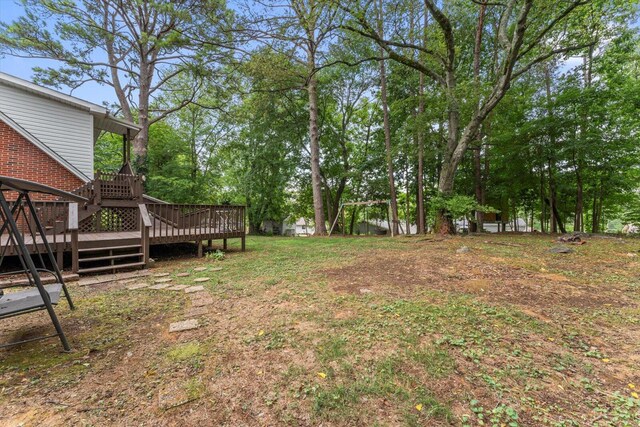 view of yard with a wooden deck