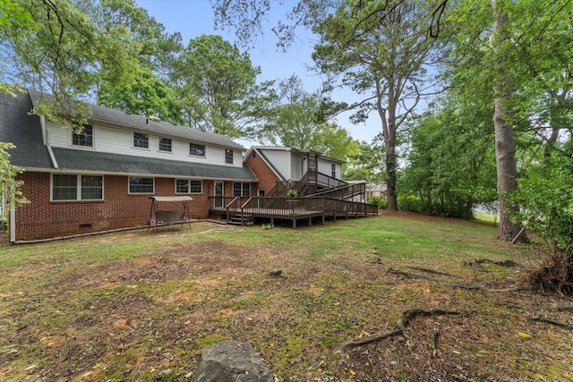 view of yard with a wooden deck