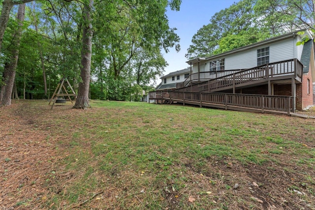 view of yard featuring a deck