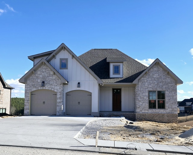 view of front of home with a garage