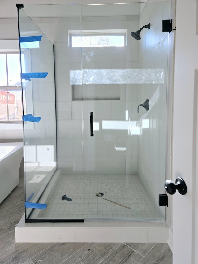 bathroom with independent shower and bath