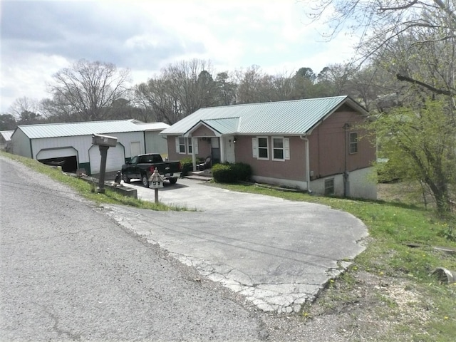 ranch-style house featuring a garage