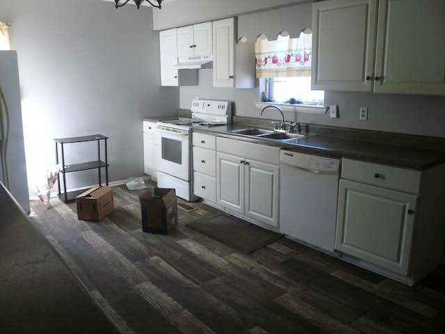 kitchen with sink, white appliances, white cabinets, and dark hardwood / wood-style floors