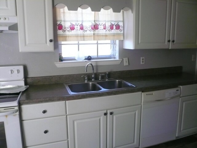 kitchen featuring sink, white appliances, ventilation hood, and white cabinets