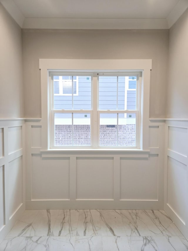 interior space featuring crown molding