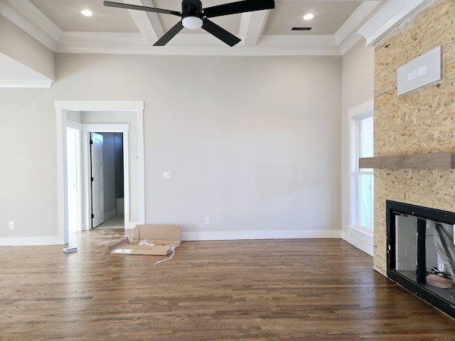 unfurnished living room featuring hardwood / wood-style flooring, coffered ceiling, and a fireplace