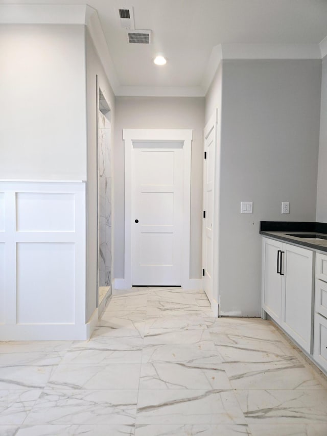 hallway with ornamental molding