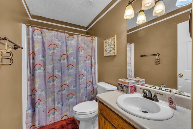 bathroom with toilet, crown molding, and vanity