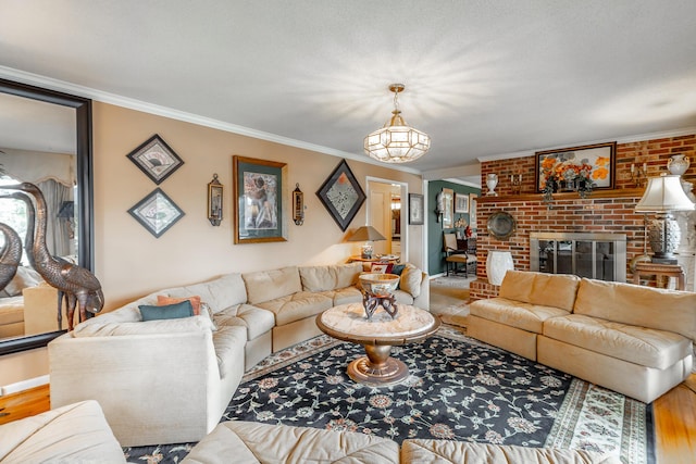 living room featuring a fireplace, wood finished floors, and crown molding