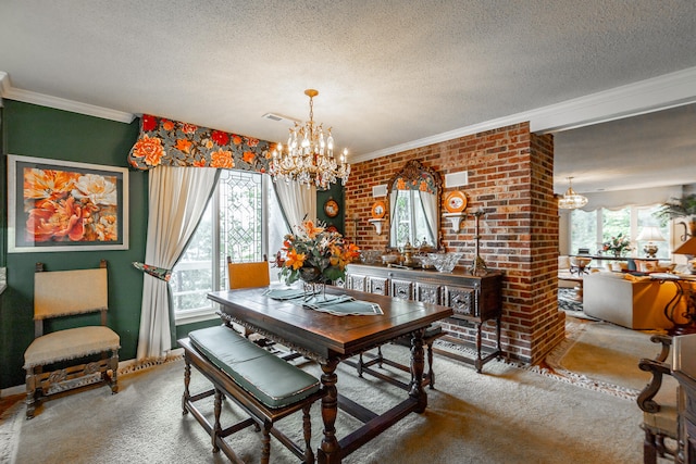 dining room featuring ornamental molding, carpet, a notable chandelier, and a textured ceiling