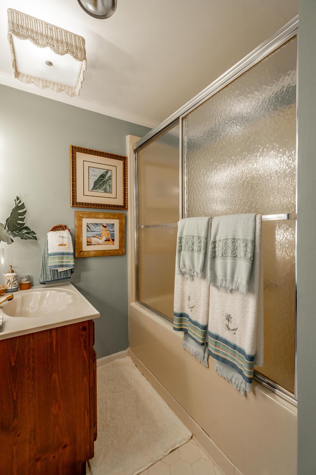 bathroom with vanity and enclosed tub / shower combo