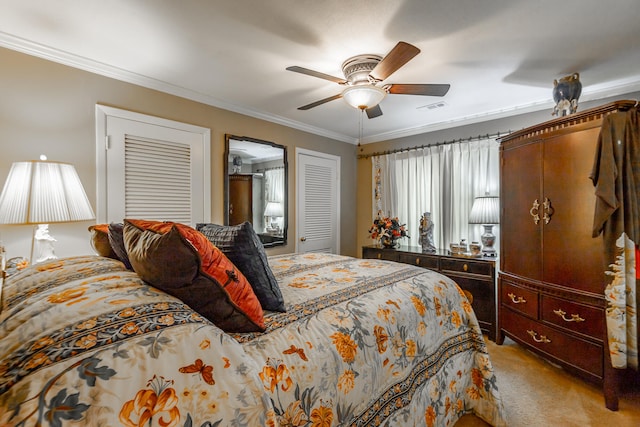 bedroom featuring crown molding, ceiling fan, and light colored carpet