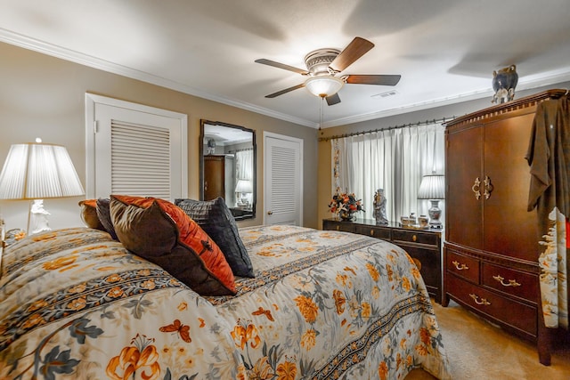 bedroom featuring light carpet, visible vents, crown molding, and ceiling fan