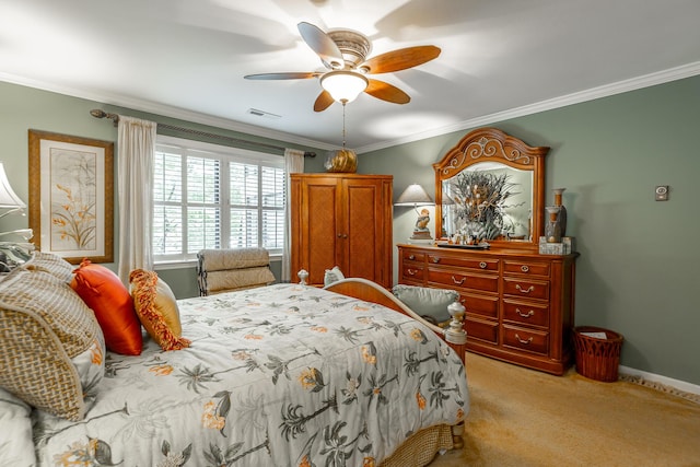 bedroom featuring light carpet, baseboards, visible vents, ceiling fan, and ornamental molding